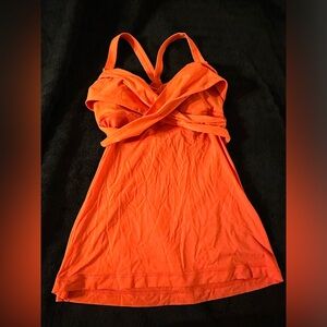 Lulu cross front and open back tank. Size 6.